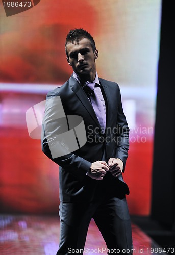 Image of male model on fashion show