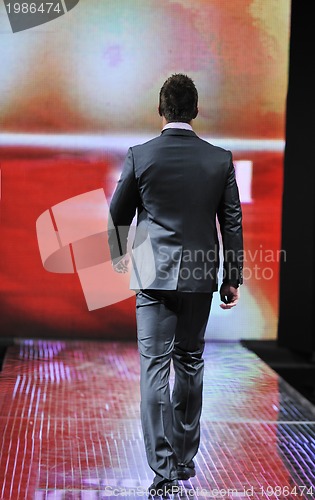 Image of male model on fashion show