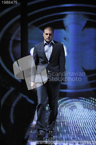 Image of male model on fashion show