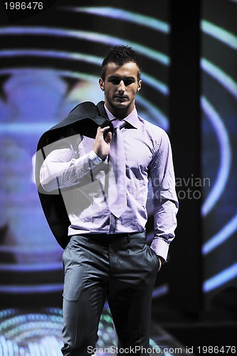 Image of male model on fashion show