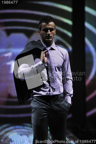 Image of male model on fashion show