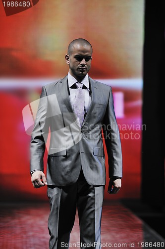 Image of male model on fashion show