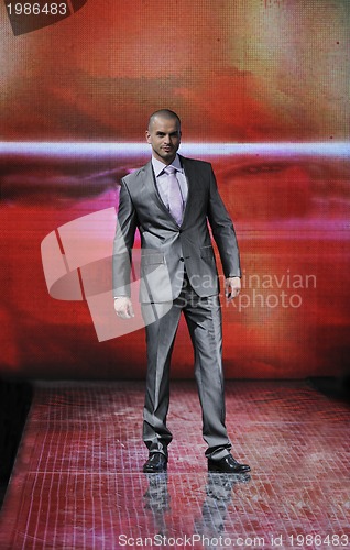 Image of male model on fashion show