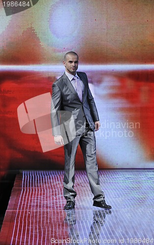 Image of male model on fashion show