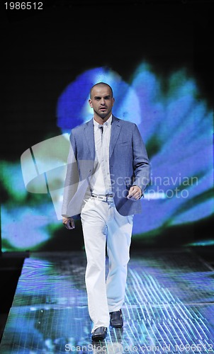 Image of male model on fashion show