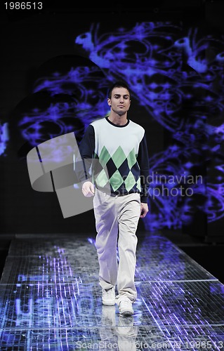 Image of male model on fashion show