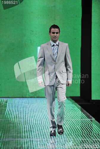 Image of male model on fashion show