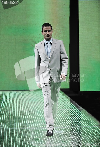 Image of male model on fashion show