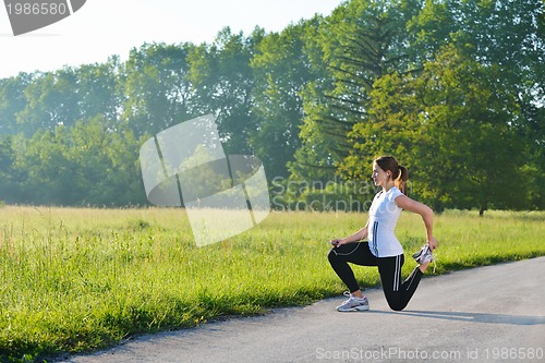 Image of woman stretching before fitness