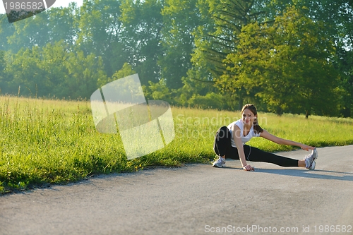 Image of woman stretching before fitness