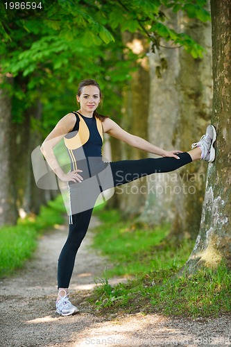 Image of woman stretching before fitness
