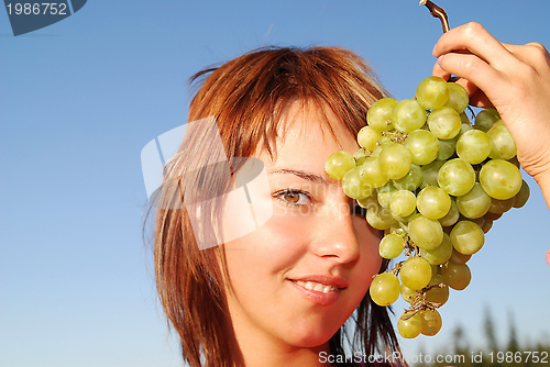 Image of smiling grape girl