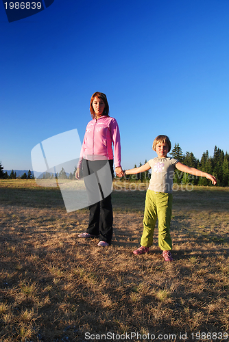 Image of happy girls in nature