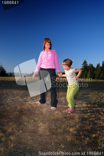 Image of happy girls in nature