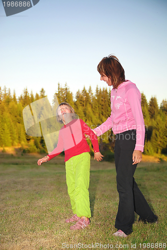 Image of happy girls in nature