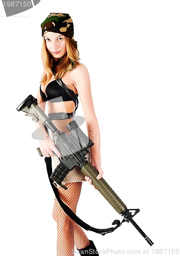 Image of pretty woman with rifle