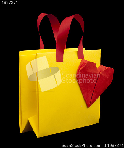 Image of Yellow shopping bag with red heart