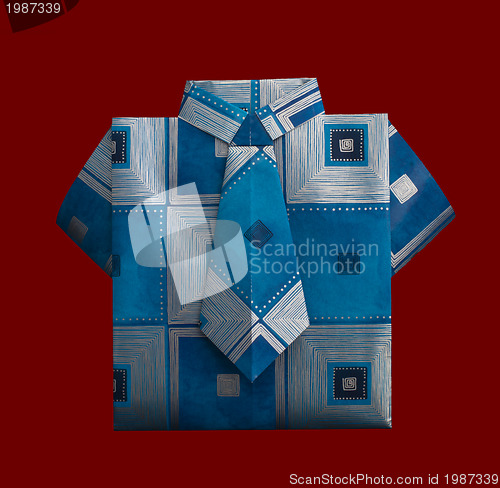 Image of Isolated paper made shirt with ornaments.