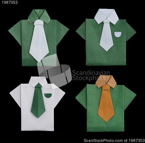 Image of Set of isolated paper made shirts.