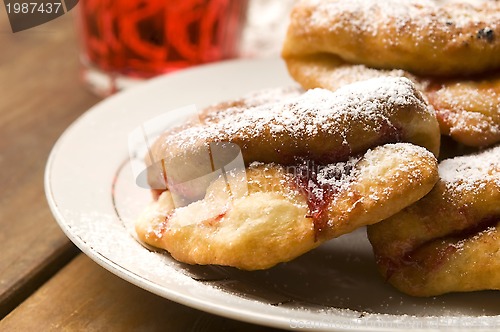 Image of Sweet doughnuts with rose marmelade