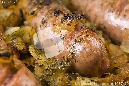 Image of Roasted sausages with sauerkraut - polish dish