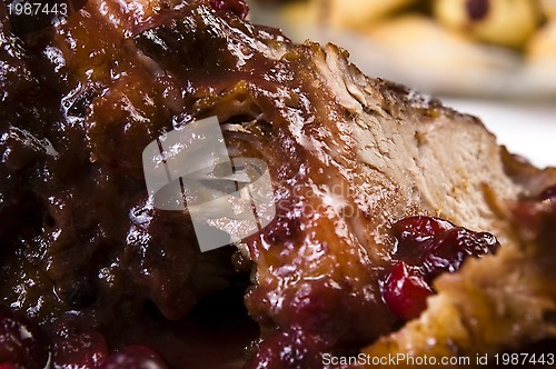 Image of Delicious Scrambled Grilled meat with cranberry sauce 