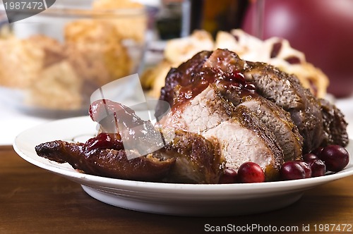 Image of Delicious Scrambled Grilled meat with cranberry sauce 