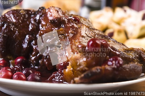 Image of Delicious Scrambled Grilled meat with cranberry sauce 