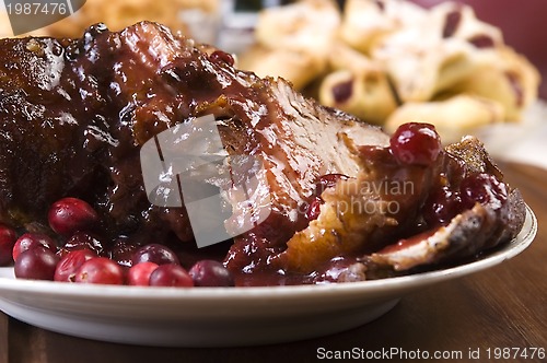 Image of Delicious Scrambled Grilled meat with cranberry sauce 