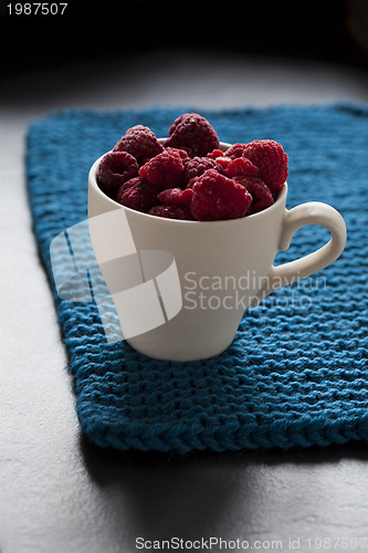 Image of Fresh raspberries in cup