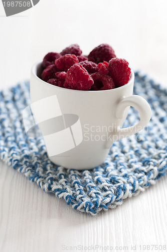 Image of Fresh raspberries in cup