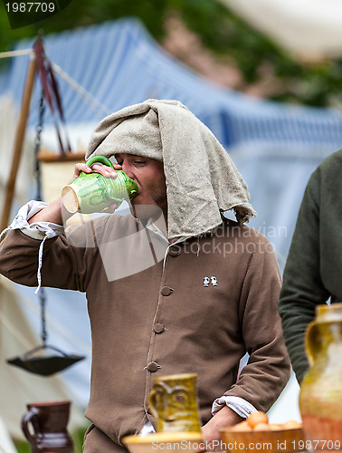 Image of Medieval Man Drinking Wine