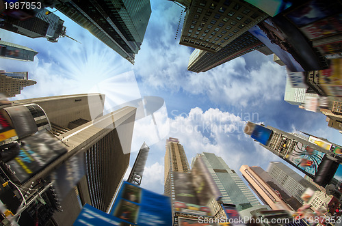 Image of Dramatic Sky above Giant Skyscrapers, fisheye view