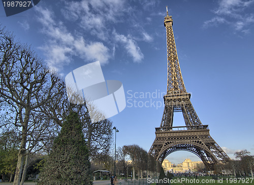 Image of Eiffel Tower and Champ de Mars in Paris, France. Famous landmark