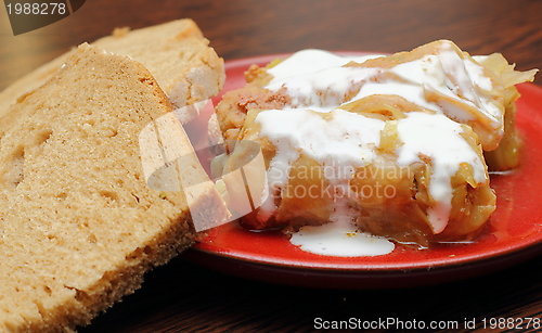 Image of stuffed cabbage and black bread