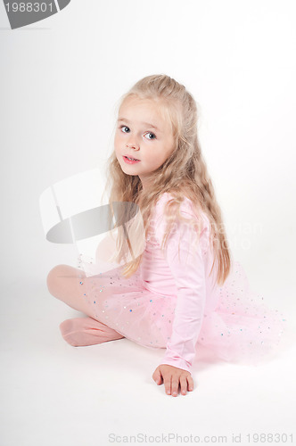 Image of Ballet dancer sitting on the floor