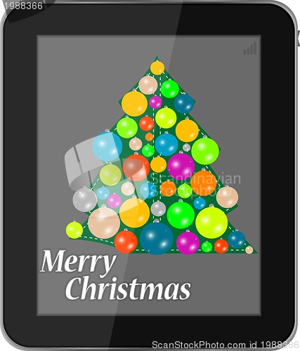 Image of Elegant christmas tree with balls on tablet pc