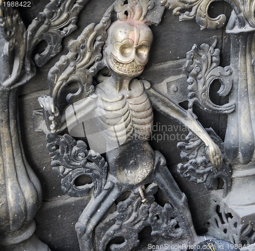 Image of metal sculpture as a symbol of death