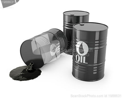Image of Three barrels and spilled oil