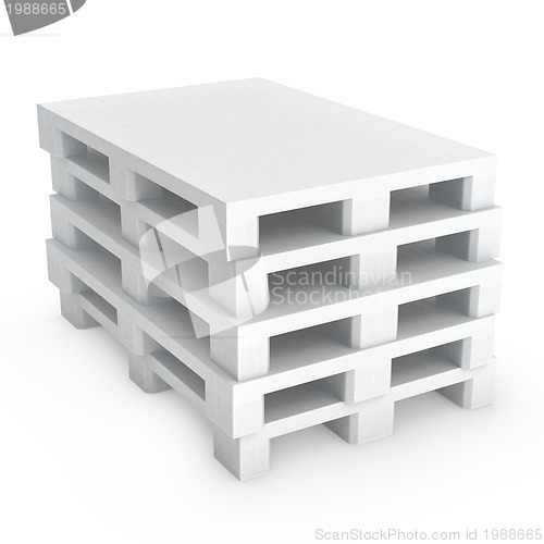 Image of Stack of white plastic pallets