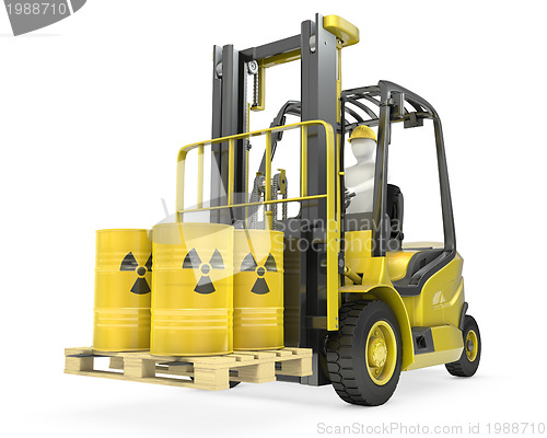 Image of Fork lift truck with radioactive barrels