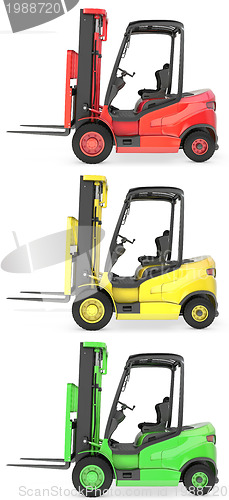 Image of Three fork lift trucks colored as traffic lights