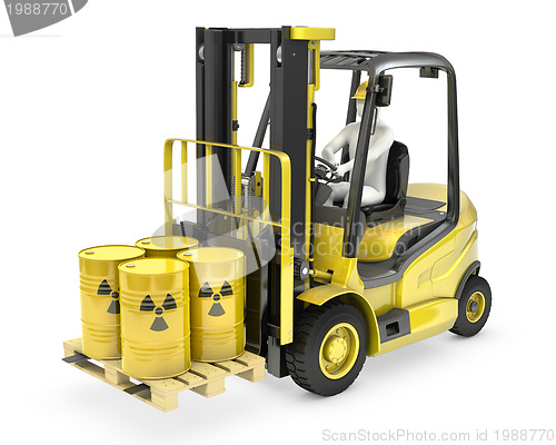 Image of Fork lift truck with radioactive barrels