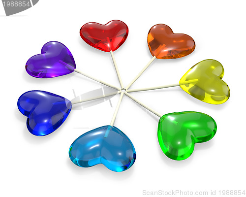 Image of Seven heart shaped lollipops colored as rainbow