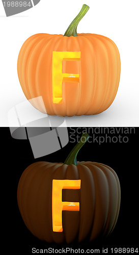 Image of F letter carved on pumpkin jack lantern