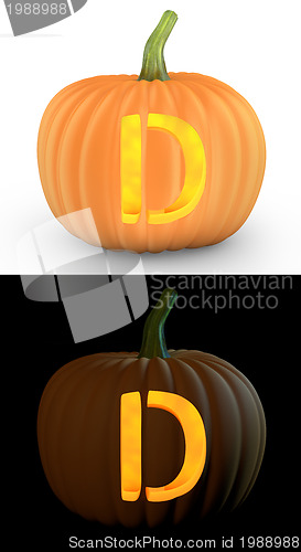 Image of D letter carved on pumpkin jack lantern