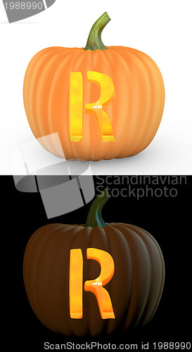 Image of R letter carved on pumpkin jack lantern