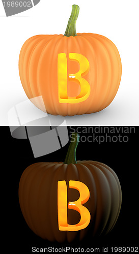 Image of B letter carved on pumpkin jack lantern