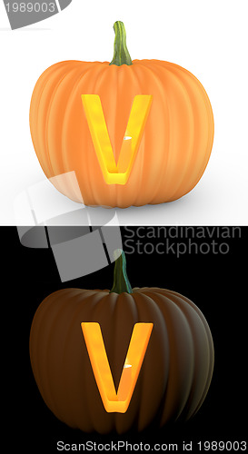 Image of V letter carved on pumpkin jack lantern