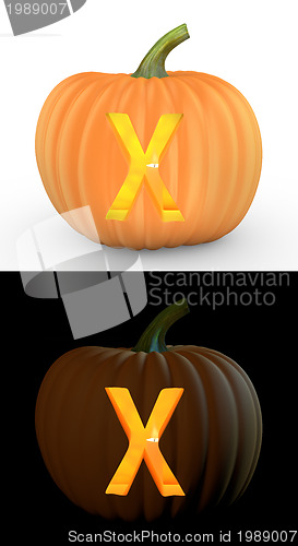 Image of X letter carved on pumpkin jack lantern